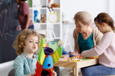 preschool-boy-playing-with-colorful-toy-rocket-2025-10-09-10-35-49-utc